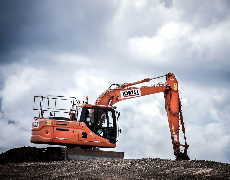 Heavy construction equipment at work site